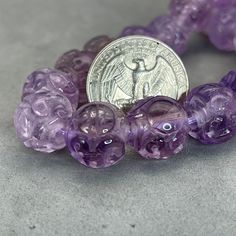 Style: Natural Purple Amethyst bead, hand carved, with symbol of longevity and dragon Material: Amethyst, natural color, purple, very translucent Method: hand carved and polished Type: Bead, Charm, mala Size: 14mm Carved Round Beads Jewelry For Meditation, Longevity Symbol, Year Of The Dragon, Amethyst Beads, Purple Stones, The Dragon, Purple Amethyst, Stone Beads, Natural Color