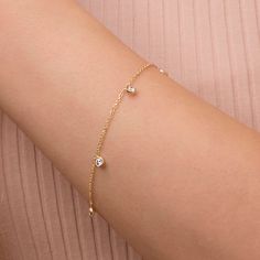 Crafted in Solid Gold, this simulated diamond bracelet is great for any occasion and it makes a perfect gift for your beloved faces.Explore our collection of Solid Gold Bracelets in competitive prices. Home Page: https://www.etsy.com/shop/ByGema ♥♥ GEMSTONES ● ZIRCON: Dimensions -> 3mm (approx. 0.12in). This Bracelet has 5 stones. Please keep in mind that the dimensions and the weight may slightly vary. ♥♥ MATERIALS This piece of my Jewels Collection is made of 9 karats or 14 karats solid gold u Dainty Rose Gold Bracelet With Brilliant Cut, Dainty Gold Bracelet With Cubic Zirconia And Adjustable Chain, Dainty Gold Bracelet With Jubilee Style And Cubic Zirconia, Dainty Gold Jubilee Bracelet With Cubic Zirconia, Dainty 14k Gold Diamond Bracelet With Brilliant Cut, Delicate Tennis Bracelet For Anniversary, Dainty Brilliant Cut Tennis Bracelet As A Gift, Dainty Gold Cubic Zirconia Bracelet For Formal Occasions, Dainty 14k Gold Tennis Bracelet