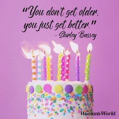 a birthday cake with lit candles on it and a quote about you don't get older, you just get better