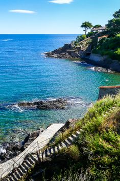 stairs lead down to the beach and into the water