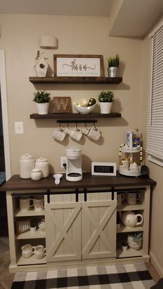 a coffee bar with two shelves above it