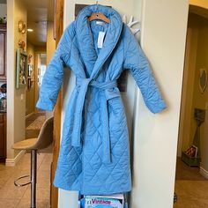 Nwt Kaleirda Baby Blue Quilted Longline Puffer Jacket Coat This Coat Is Amazing!! So Warm And Cozy From Head To Toe Beautiful Robins Egg Blue Pockets Quilted Strap Luxury Puffer Quilted Pattern Size Large Measurements Underarm To Underarm 25” Laid Out Flat Length 45” Shoulder To Shoulder 21” There’s Not A Set Point To The Shoulders So Could Fit Larger As Well Fitted Blue Outerwear For Loungewear, Blue Outerwear For Spring Loungewear, Oversized Light Blue Winter Outerwear, Fitted Winter Outerwear For Loungewear, Blue Long Sleeve Outerwear For Daywear, Blue Winter Outerwear For Daywear, Puffer Coat With Fur, Brown Puffer Jacket, Grey Puffer Jacket