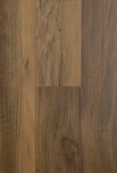 wood flooring that looks like it has been made from natural materials and is very hard to