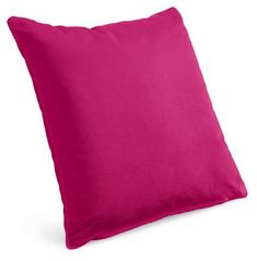 a bright pink pillow on a white background