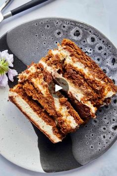 two slices of carrot cake on a plate