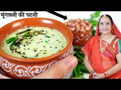 a woman holding a bowl of food in her hand