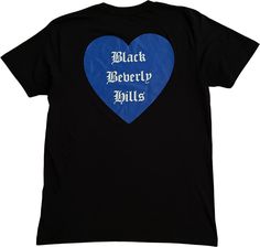 Black Beverly Hills black 100% cotton shirt is printed at front with "Love Thy Neighborhood" design with White print and the Black Beverly Hills heart on back. Black Short Sleeve T-shirt With Heart Print, Black Cotton T-shirt With Heart Graphic, Black Band Merch Top With Heart Graphic, Black Band Merch T-shirt With Heart Graphic, Black Graphic Tee With Heart Print, Black Heart Print Graphic Tee, Black Cotton Shirt With Back Print, Black Graphic Tee With Heart Graphic, Black Graphic Tee Shirt With Heart Graphic