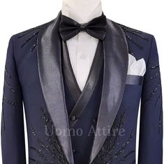 Description Here are the product design details of tailored-made navy blue embellished tuxedo 3 piece suit. Jacket Design FABRIC : 100% Woolen Fabric FITTING STYLE : Slim FitI(Tailored-made) LAPEL STYLE : Satin Shawl Lapel CHEST POCKET : Welt Pocket Square LOWER POCKET : Double Flapped Pockets NO OF BUTTONS : Single Button SLEEVE BUTTONS : Four Buttons FUNCTIONAL SLEEVE BUTTON HOLES : No BUTTONS HOLE THREAD : Same Fabric BACK VENT STYLE : Double Vent LINING OPTIONS : Full Lined EXTRA OPTIONS : P Blue Groom Tuxedo, Pocket Shirt Design, Navy Blue Shawl, Navy Blue Groom, Tuxedo Suit For Men, Blue Groom, Waistcoat Designs, Formal Attire For Men, Shawl Collar Tuxedo