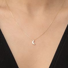 14k Solid Gold Moon Necklace, Yellow Gold Crescent Moon Pendant, Dainty Moon Charm Pendant, Celestial Necklace, Birthday Gift *Free Express International Shipping *14K solid gold chain is included. NEXT BUSINESS DAY SHIPPING! PRODUCT DETAILS *The product is made of 100% 14k Solid Gold and it has a 14K or 585 stamp on item. (We don't sell filled or plated jewelry) *The package includes a gold certificate.  *The product includes 14K solid gold chain. *Every package comes in a gift box. *14K gold indicates that the product is produced from 58% pure gold. *Chain thickness: 0.80 mm /0,023 inches *Pendant (moon charm) measures: 8mm  x 5.70mm *The product is yellow gold. *       Made in Türkiye. ORDER PROCESS *We have some options for the chain length.  ABOUT SHIPPING We ship all packages safely Moon Charm Necklace, Minimalist Moon Shaped Jewelry For Anniversary, Minimalist Moon-shaped Jewelry For Anniversary, Delicate Moon-shaped Jewelry Gift, Delicate Moon Shaped Jewelry For Gift, Dainty Moon-shaped Wedding Necklace, Minimalist Moon Shaped Necklace For Anniversary, Minimalist Moon Necklace For Anniversary, Delicate Moon Shaped Jewelry For Anniversary