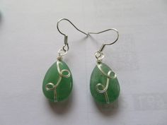 Earrings-Green Aventurine gemstone- Hang Drop earrings-Silver findings and decorations -tear drop shaped -gift See my shop at https://www.Merlinscaveshop.com A PERFECT PLACE TO FIND THAT SOMETHING SPECIAL FOR SOMEONE Silver Teardrop Earrings With Natural Stones, Silver Aventurine Dangle Jewelry, Earrings Green, Silver Drop Earrings, Green Aventurine, Tear Drop, Earrings Silver, Something Special, Perfect Place