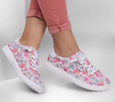 Pretty style and casual comfort combine in BOBS from Skechers BOBS D'Vine - Floral Flair. This vegan sneaker features a cotton canvas upper with an allover vintage floral print, tied-off decorative laces, and a cushioned Skechers Memory Foam insole. For every BOBS purchase, a donation is made to animals in need. | Skechers Women's BOBS D'Vine - Floral Flair Sneaker | Medium Width | Skechers Memory Foam cushioned comfort insole | No-Tie Fit for ease of wear | Crafted with 100% vegan materials | C Casual Cotton Canvas Shoes, Comfortable Floral Print Sneakers For Spring, Casual Lace-up Sneakers With Floral Print, Casual Floral Print Lace-up Sneakers, Spring Cotton Sneakers For Streetwear, Trendy Canvas Sneakers For Spring, Spring Canvas Shoes With Laces, Floral Print Textile Sneakers For Spring, Trendy Cotton Sneakers For Spring