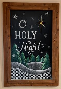 a chalkboard with the words holly night written on it