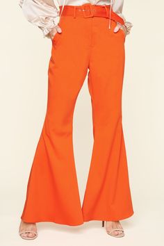 Do the hustle in the Power Moves Bell Bottom Pants that feature a high waist and slim fit throughout the hips and thighs. Side pockets are added at both sides and a covered buckle belt is added at the waist. Pair the pants with your favorite blouse, add some heels, and you're all set to go out.- Bell bottoms- Zipper fly- Covered buckle belt- High waisted- Comes in 6 colorsSize + Fit - Model is 5'9" and wearing size XS- Measurements taken from size S - Waist: 26 1/2"- Length: 32 3/8" fabricSelf: Party Wide-leg Cargo Pants With Pockets, Trendy Flared Pants With Belt Loops, Chic Full-length Pants With Hip Pockets, Trendy Belted Straight Pants, Trendy Belted Trousers, Casual High Waist Bottoms With Belted Cuffs, Spring High Waist Pants With Belted Cuffs, Casual High-waist Bottoms With Belted Cuffs, High Waist Bottoms With Belted Cuffs For Spring