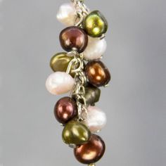 "The colorful dangling chandelier earrings are handmade using fresh water pearl. Perfect gift for any occasion! Free U.S shipping! Anni Designs. A colorful palette could be pastel or vibrant. The pastel color palette is soft and sophisticated, the vibrant color palette is vigorous and infectious. They both could go with many outfits due to the rich mixture of different colors. The length of the earrings is: 1 ¼ inches, or 3.0 cm. (excluding the length of hook) Customers who purchased the earring Multicolor Pearl Drop Jewelry As Gift, Multicolor Pearl Earrings As A Gift, Multicolor Handmade Pearl Earrings For Gift, Handmade Multicolor Pearl Earrings For Gift, Handmade Multicolor Pearl Earrings Gift, Multicolor Pearl Earrings Set As A Gift, Multicolor Pearl Drop Earrings For Gift, Elegant Multicolor Dangle Pearl Earrings, Handmade Pearl Chandelier Earrings Gift