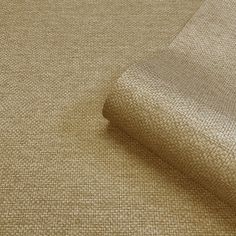 a close up view of a beige fabric