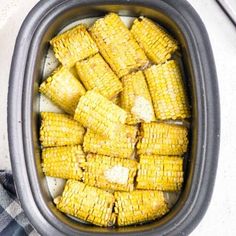 an overhead view of corn in a crock pot