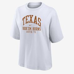 Made with soft cotton, this roomy Texas tee gives you a relaxed look without feeling too oversized and lets your cheer on the Longhorns in comfort. White Nike T-shirt For Game Day, Oversized Nike T-shirt With Graphic Print, Casual Oversized White Cropped T-shirt, Oversized White Cropped T-shirt, Casual, White School Spirit T-shirt For Everyday, White Pre-shrunk T-shirt For Loungewear, White Relaxed Fit Cropped T-shirt With Text Print, White Cropped T-shirt With Text Print, Relaxed Fit, White Oversized Tops For School Spirit