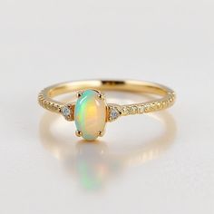 Opal ring for women gold, sterling silver Genuine opal ring vintage opal ring white gold, opal jewelry Handmade Jewelry Opal Ring for Women - Vintage Gold and Sterling Silver Opal Jewelry Description: Elevate your style with our exquisite Handmade Opal Ring for Women, meticulously crafted to capture the timeless allure of opals. Available in both classic sterling silver and elegant gold, this vintage-inspired piece is a true testament to opal's natural beauty. Specifications: Material: Solid 925 Gold Opal Jewelry, Vintage Opal Ring, Ring For Women Gold, Opal Ring Vintage, Jewelry Opal, Timeless Ring, Ring White Gold, Opal Ring, Color Ring