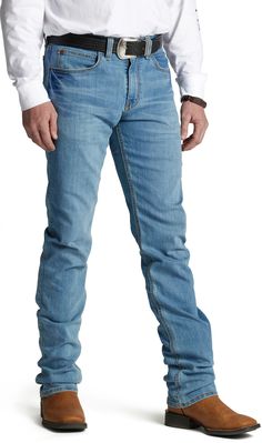 The Justin 1879 J2 Straight Slim Fit denim has a snug fit through the hip and thigh featuring abrasion-resisting denim. They're made with a strong sturdy material that comes in three washes with a tapered boot opening, allowing you to transition from offi Rugged Fitted Straight Leg Jeans, Rugged Fitted Jeans With Five Pockets, Rugged Fitted Denim Jeans, Rugged Fitted Denim Blue Bottoms, Fitted Rugged Jeans In Medium Wash, Fitted Rugged Denim Blue Bottoms, Slim Fit Mens Jeans, Justin Boots Men, Justin Boots