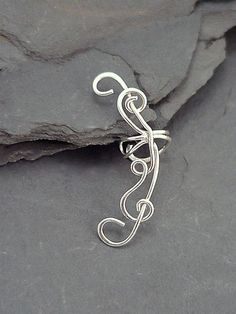 ear cuff Silver Spiral Adjustable Ear Cuff, Wire Ear Cuffs, Ear Cuff Silver, Leaf Ear Cuffs, Wrap Earrings, Silver Ear Cuff, Sterling Silver Flowers, Silver Flowers, Jewelry Creation