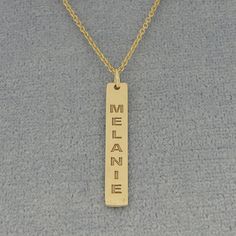 "*Bar Measurement: 1 inch (26 mm) X 3/16 inch (4.8 mm) Approx. *Pendant Thickness: 0.7 mm / 22 Gauges / 0.028\" *Up to 9 Letters, numbers or symbols. *Chain : Optional (1.0 mm Rollo chain 16, 18 or 20 inch). *Premium high end quality fine solid 10kt or 14kt solid yellow or white gold vertical bar necklace with high polished finish and deeply laser engraved your name or word and cut out by latest technology laser machine, top quality guaranteed." Stamped Yellow Gold Brass Jewelry, 14k Gold Engraved Nameplate Jewelry, 14k Gold Stamped Jewelry As Gift, Gold Engraved Rectangular Pendant Jewelry, Personalized Yellow Gold Jewelry With Rectangular Shape, Personalized 14k Gold Memorial Jewelry, Personalized 14k Gold Jewelry For Memorial, Gold Rectangular Pendant Jewelry Stamped 14k, Personalized Gold Jewelry For Memorial