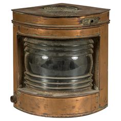 an old fashioned metal and wood lantern