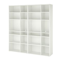 a white bookcase with six shelves on each side