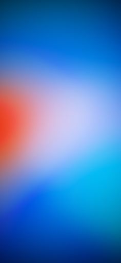 an abstract blurry background in blue and red