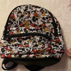 Disney Backpack New With Tags Casual Black Backpack For Disney Trips, Trendy Minnie Mouse Travel Backpack, Trendy Minnie Mouse Backpack For Travel, Mickey Mouse Standard Backpack For Disney Trips, Mickey Mouse Themed Backpack For Disney Trips, Casual Minnie Mouse Backpack For Disney Trips, Casual Mickey Mouse School Backpack, Casual Minnie Mouse Backpack For Travel, Casual Black Mickey Mouse Backpack