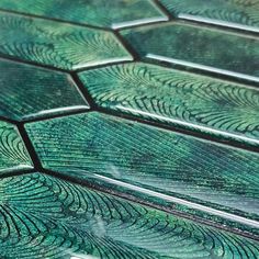 close up view of green glass tiles