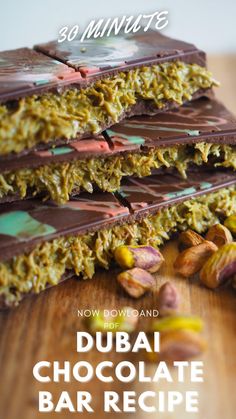 some kind of chocolate bar with nuts on top and the words, now downsand dubai chocolate bar recipe