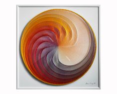 an art work with multiple colors in the shape of a spiral on a white background