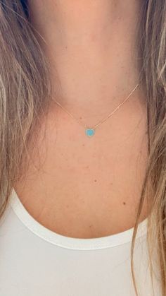 Turquoise Small Heart Necklace | Real Turquoise CZ| 14K Gold | 8MM Heart Gold Chain | Dainty Necklace | | Minimalist Jewelry | SOLID GOLD ♦ Materials: 14K Yellow Gold, Real Turquoise Cubic Zirconia ♦ Available colors: Yellow Gold  ♦ Necklace measurements: 16"-18" can be hooked at either length, for a total length of 18". The chain is 1MM wide. The charm is 8MM -------------------------------------------------- ♦ -------------------------------------------------- MATERIALS All chains and pendants are made of 14K Solid Gold  HOW TO FIND YOUR PERFECT FIT Your neck size is probably the most important measurement for determining which necklace length will work best for you. To measure, wrap a soft tape measure around your neck, keeping the tape measure parallel to the floor as you measure. Then Blue Dainty Jewelry For Valentine's Day, Dainty Blue Necklace With Heart Charm, Dainty Blue Necklace For Valentine's Day, Blue Dainty Necklace With Heart Charm, Turquoise Heart Necklace For Valentine's Day, Dainty Blue Heart-shaped Necklace, Heart-shaped Turquoise Necklace As Gift, Turquoise Heart Charm Jewelry, Turquoise Heart Necklace For Gift