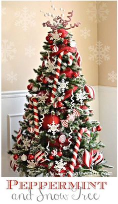 a red and white christmas tree with candy canes