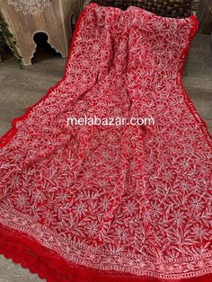 Beautiful and lightweight Chikankari hand embroidered geoDupatta with crochet lace. Red Chikankari Embroidered Fabric For Traditional Ceremonies, Red Chikankari Embroidery Fabric For Traditional Ceremonies, Traditional Unstitched Embroidered Fabric With Lace Work, Semi-stitched Cotton Dupatta With Lace Work, Red Bohemian Dupatta With Chikankari Embroidery, Bollywood Style Cotton Dupatta With Lace Work, Traditional Embroidered Fabric With Lace Work, Multicolor Embroidered Chikankari Dupatta, Traditional Unstitched Saree With Lace Work