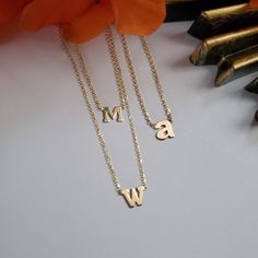 Double initial necklace choker, layered look.could be made with lower case letters Personalized 14k Gold Delicate Chain Necklace, Personalized Yellow Gold Initial Necklace With Delicate Chain, Minimalist 14k Gold Initial Necklace For Mother's Day, Dainty Initial Necklace With Adjustable Chain For Her, Dainty Initial Necklace With Adjustable Chain For Mother's Day, Dainty Initial Necklace As A Gift For Her, 14k Gold Initial Necklace With Adjustable Chain, 14k Gold Initial Necklace With Adjustable Chain As Gift, Minimalist Tarnish Resistant Initial Necklace For Mother's Day