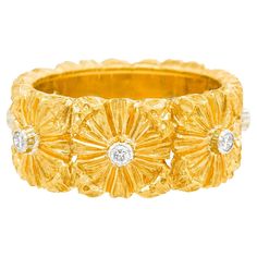 Circa 2000s, 18k, by Buccellati, Italy. Renowned for combining sublime hand-engraved goldwork with contemporary fashion, Buccellati jewelry has energy and originality that is effortlessly chic. With its stylishly fresh look, this band's goldwork is particularly fine (with special note taken of the floral motif). Well-made and in unworn condition, this size 6 1/2 ring is in excellent condition. Remark: "Often copied but never duplicated, Buccellati jewelry is superb. True luxury is owning an orig Buccellati Jewelry, Italy Jewelry, Gold Work, Fresh Look, Flower Ring, Hand Engraving, Contemporary Fashion, Floral Motif, Gold Ring