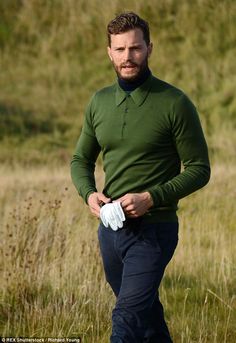 Good-looking: The matinee idol was typically well-dressed in a pair of blue chinos and green turtle-neck sweater, which he matched with a pair of trainers Green Men Outfit, Golf Style Men, Alfred Dunhill, Blue Chinos, Mens Fashion Smart, British Men, Christian Grey, Green Outfit