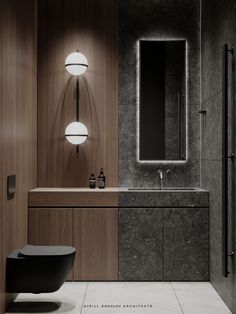 a bathroom with a sink, mirror and lights on the wall next to the bathtub