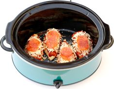 four pepperoni pizzas in a slow cooker