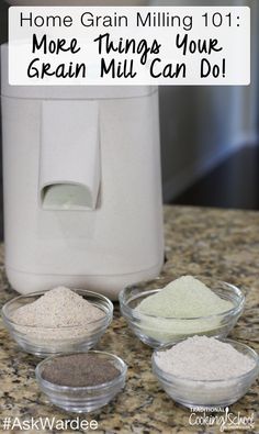 three bowls filled with grains sitting on top of a counter next to a blender