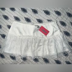 Brand New With Tags, Never Worn. White Ruffled Skort For Party, Flirty White Bottoms With Lace Trim, Flirty White Lined Skirt Bottoms, Flirty White Lined Skirt, Party Flared Skirt Bottoms With Lace Trim, Flirty Mini Skirt With Lace Trim, Fitted Flared Skirt With Lace Trim, Fitted Lace Trim Flared Skirt, Casual Party Bottoms With Lace Trim