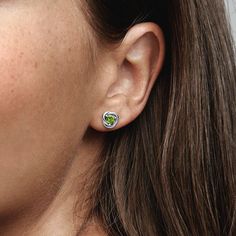 Add a pop of color to your looks with our Spring Green Eternity Circle Stud Earrings. These sterling silver pieces are made in the shape of an infinity braid and set with a vibrant green man-made crystal at their centers. Symbolizing eternity, add these sparkling studs to your styling to give your everyday jewelry a bright update. Pandora August Birthstone Eternity Circle Stud Earrings | Sterling Silver | 292334C03 Avengers Infinity Stones, Royal Chain, Infinity Braid, Everyday Jewellery, Circle Stud Earrings, Circle Earrings Studs, Custom Pendants, Circle Studs, Colour Yellow