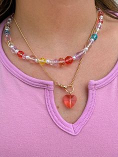 The perfect summer accessory- necklaces with the cutest rainbow beads!! Adds some fun and color to every outfit and is THE necklace of the summer!! Approx. Length 16.5+2" Add another necklace! Fruity Charm Necklace https://www.aspynandivy.com/products/fruit-charm-necklace?_pos=2&_sid=52fe803c9&_ss=r Trendy Crystal Necklace With Beaded Chain, Trendy Rainbow Necklaces With Tiny Beads, Trendy Charm Necklaces With Colorful Beads, Trendy Beaded Chain Charm Necklaces For Jewelry Making, Trendy Colorful Jewelry With Heart Beads, Colorful Heart Beads Necklaces For Jewelry Making, Rainbow Beaded Chain Necklace For Summer, Trendy Rainbow Necklace With Colorful Beads, Trendy Rainbow Necklace With Heart Beads