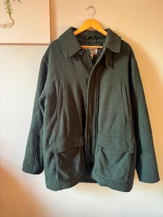 This green wool LL Bean zip up jacket is in great vintage condition. It is labeled a size "L"  Sleeves: 24 inches  Height: 31 inches  Width: 24 inches Green Wool Outerwear With Buttons, Oversized Green Wool Outerwear, Vintage Green Outerwear With Button Closure, Green Wool Single-breasted Outerwear, Vintage Ll Bean, Ll Bean, Green Wool, Wool Jacket, Zip Ups