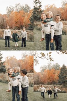 three children are playing with each other in the grass and one is holding another child