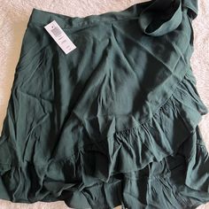 Aritzia Sunday Best Skirt Green Size Xs New With Tags Chic Green Tiered Skort, Green Ruffled Mini Skirt Skort, Green Asymmetrical Skort For Summer, Summer Green Asymmetrical Skort, Green Tiered Skort For Summer, Casual Asymmetrical Flowy Skort, Casual Asymmetrical Skort, Green Casual Mini Wrap Skirt, Casual Green Mini Wrap Skirt