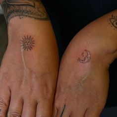 two people with matching tattoos on their feet, one has a sun and the other has a moon