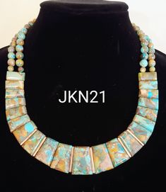 "Hard to find Royston Turquoise necklace by Jay King features a bib of graduated slabs with copper colored .925 sterling silver accents, suspended from double strands of turquoise beads. It's approximately 18\" with a 3\" extender and closure, also in copper colored .925 sterling. Never worn, in original box." Bee Jewelry, Royston Turquoise, Button Earrings, Bib Necklace, Silver Accents, Turquoise Beads, Chain Styles, Windsor, Turquoise Necklace