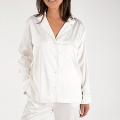 The Birdie Satin Pajamas are certain to become the most refined addition to your loungewear edit. These pajamas are made with luxurious, silky satin that washes beautifully. The button-front top has a notched collar and standard-length sleeves. These are the comfortable, relaxed PJs you’ll live in, gift to everyone, and pack with you wherever you go.Material: Poly-satin fabricSize & Fit: Fits for a more tailored style. Size up if in between sizes. 26.5" InseamCare guide: Machine wash cold with l Elegant Silk Sleepwear With Relaxed Fit, Elegant Modal Satin Sleepwear For Loungewear, Luxury Silk Long Sleeve Sleepwear, Luxury Long Sleeve Silk Sleepwear, White Silk Long-sleeve Sleepwear, White Silk Long Sleeve Sleepwear, Elegant Long Sleeve Sleepwear With Satin Finish, Elegant Long Sleeve Satin Sleepwear, Long Pajamas